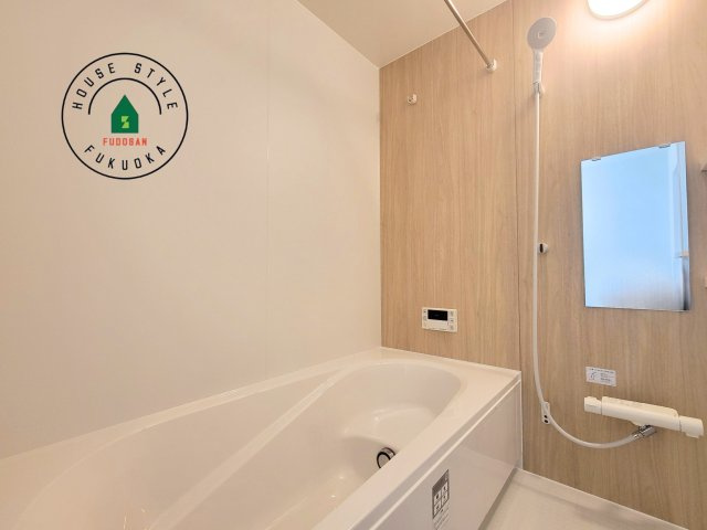 福岡市東区美和台3丁目第2-2棟（1号棟）の内観：施工例|1日の疲れを癒してくれる広々バスルーム。雨の日のお洗濯にも大活躍な浴室乾燥機付です！