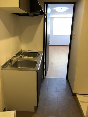 中野第２ビルのキッチン|コンパクトなキッチンで掃除もラクラク