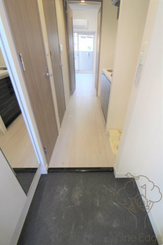プレサンス天神橋筋六丁目ヴォワールの玄関