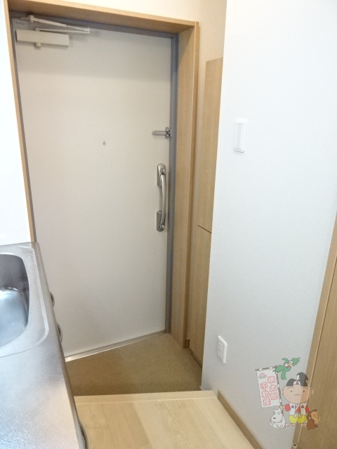 ピアルアーナ東古松の玄関