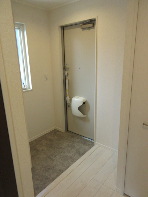 ハイムリバーフラットの玄関