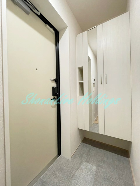 茅ヶ崎市小和田２丁目の賃貸マンションの玄関