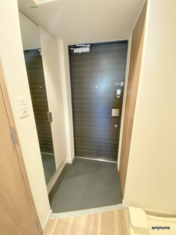 プレサンスドームシティ 仲介手数料無料の玄関