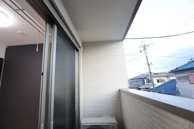 ジーメゾン生駒プレシールのバルコニー