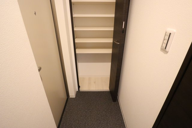 ジーメゾン生駒プレシールの玄関