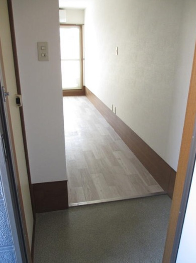 チコレジデンスの玄関