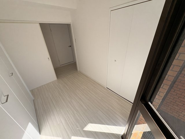 ライオンズマンション学園前の洋室
