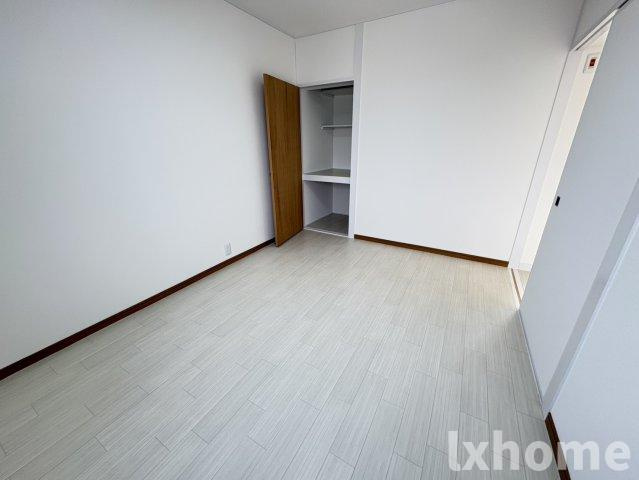マンション沢良宜東B棟の寝室