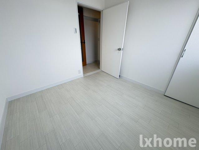 マンション沢良宜東B棟の寝室