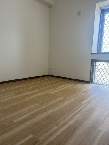 エイルマンション唐津駅前の洋室