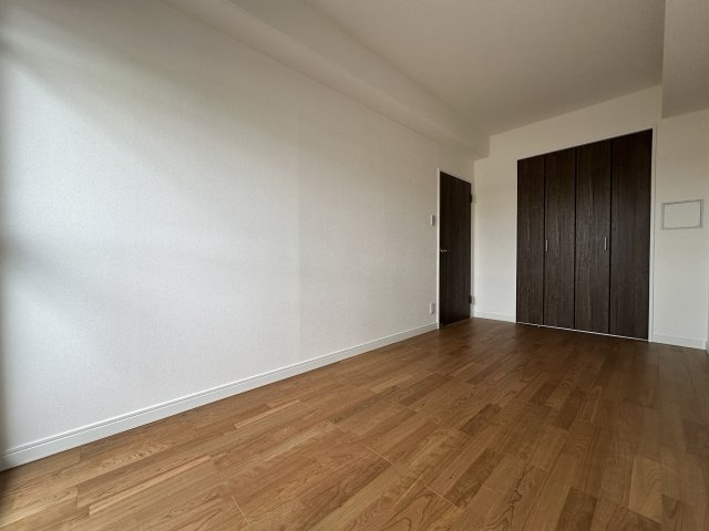 ガーデンビラ舞子1号棟の洋室