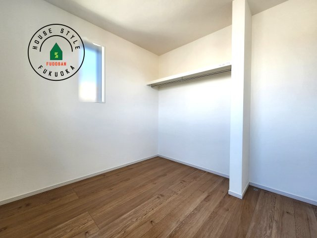 福岡市屋形原1丁目第2-2棟(2号棟)の内観：施工例|落ち着いた色調の洋室です。