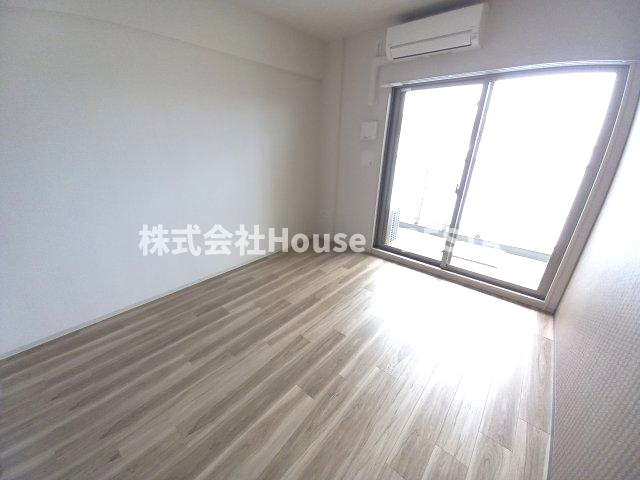 レジュールアッシュ神戸湊川公園の寝室