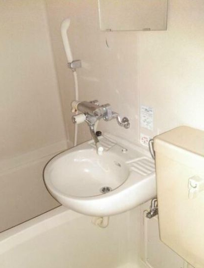 ファサードクロスの洗面所|洗面台