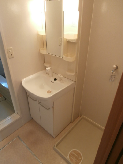 リビングタウン旭川　B棟の洗面所