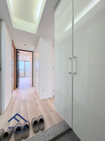 コスモ長尾リバーフォルムの玄関