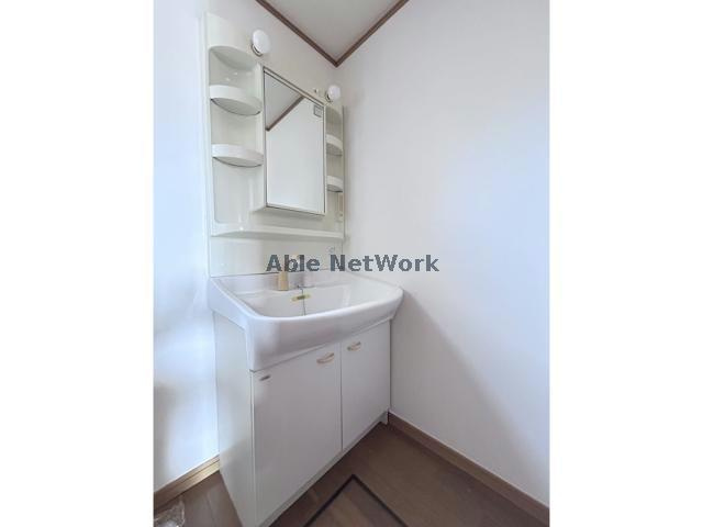 ＦａｍｉｌｉａⅡの洗面所|シャワー付洗面台