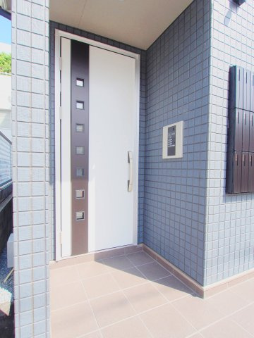 ＭＩＮＩＮＧ２番館のエントランス