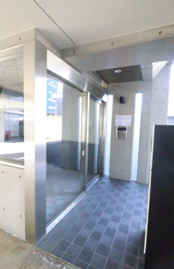 熊本市中央区坪井３丁目の賃貸マンションの玄関