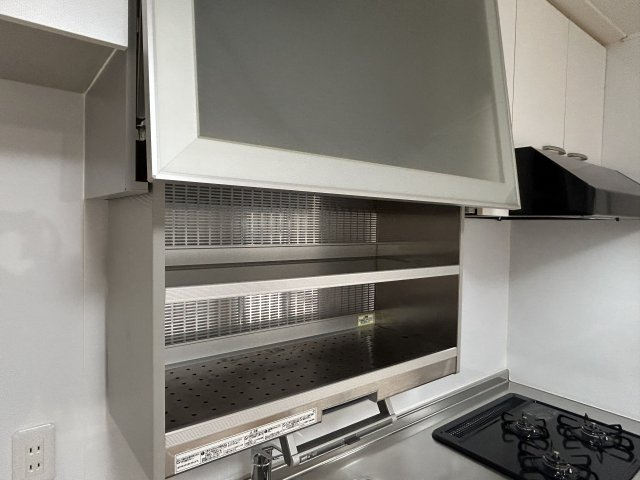 宮前平グリーンハイツのキッチン|電動式収納