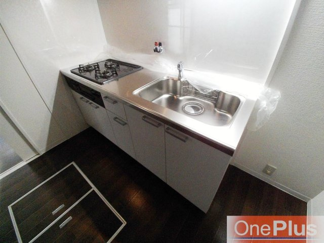 コスモ深江北町のキッチン|コンパクトなキッチンで掃除もラクラク