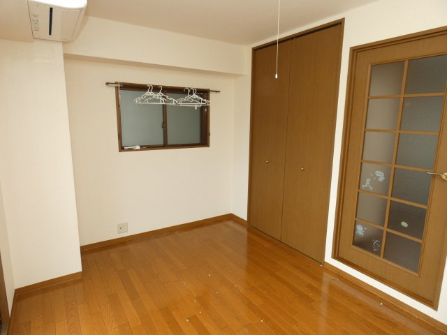 Sキューブほんまちの寝室