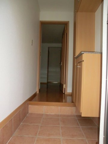 メゾン　ド　コリ－ヌの玄関