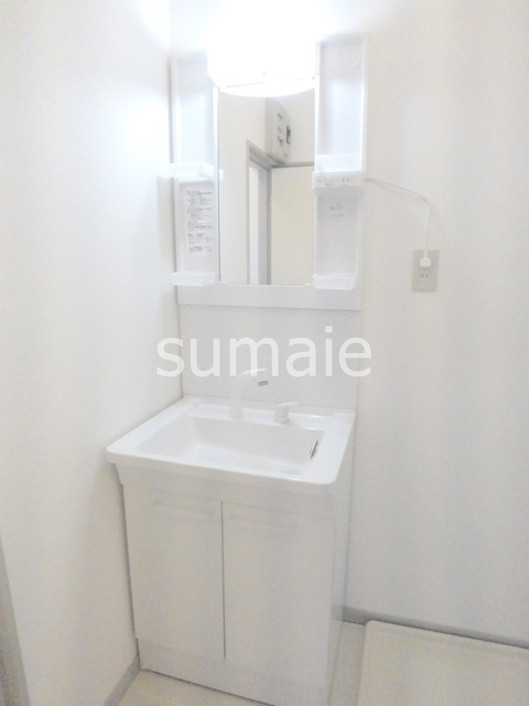 須賀コーポの洗面所|独立洗面台です。