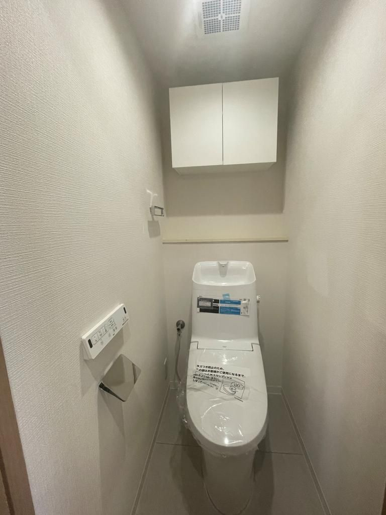 多摩市落合１丁目の中古マンションのトイレ