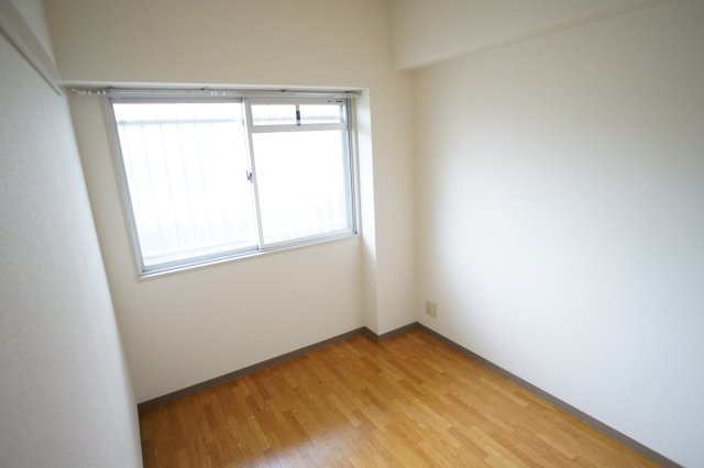 ジュネス東生駒の玄関