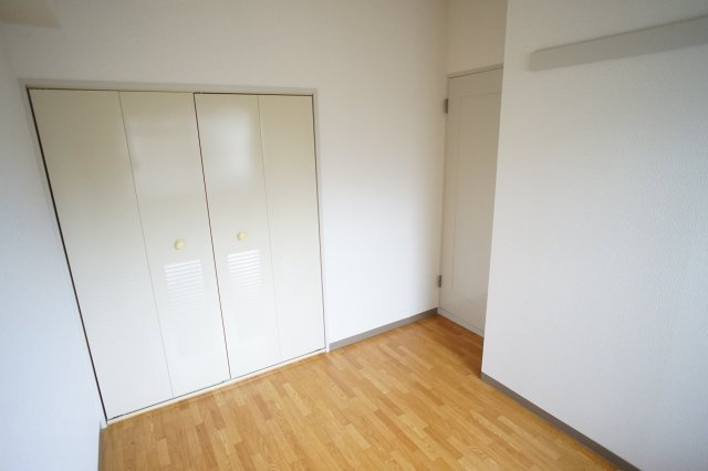 ジュネス東生駒の玄関