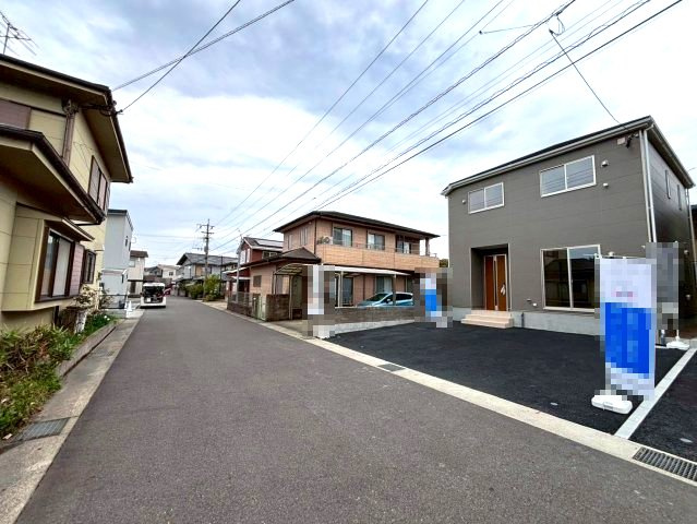 明和1丁目　新築戸建ての前面道路含む現地写真|前面道路は鹿児島市道（幅員6.0ｍ）です。閑静な住宅街の一画。