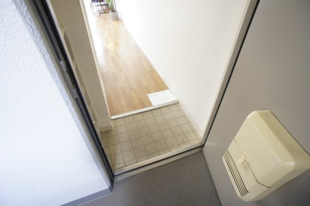 シティホームズ富雄駅前の玄関