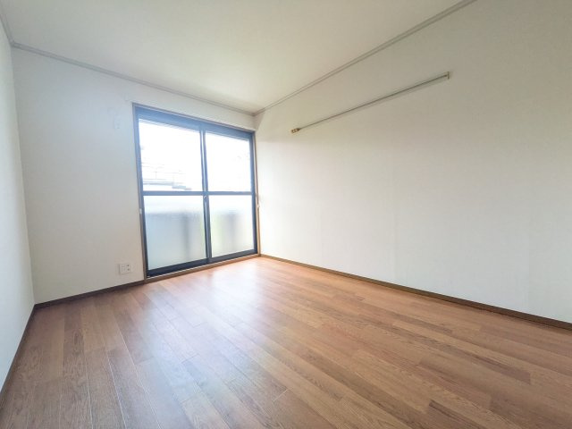 アダージョ東山田の寝室