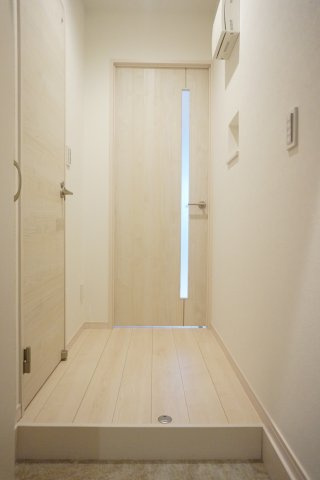 熊本市中央区黒髪２丁目のアパートの玄関