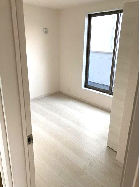 マイホームネクスト港区津金の寝室