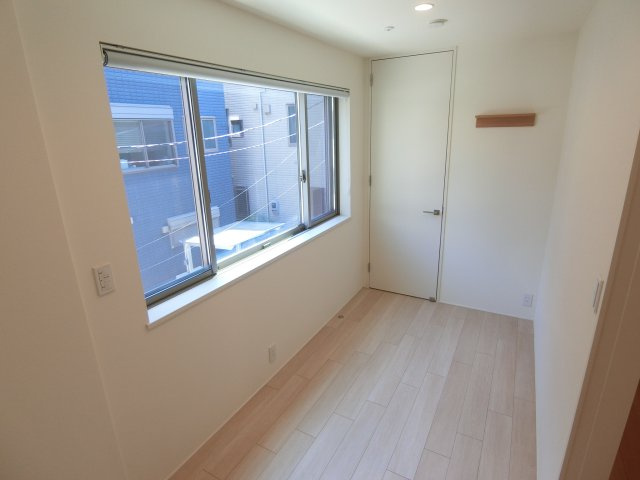 上丸子天神町戸建の寝室