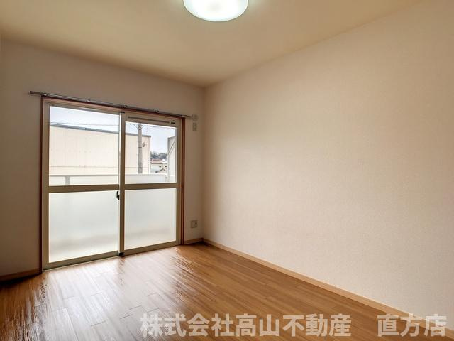直方市大字感田の賃貸マンションの寝室