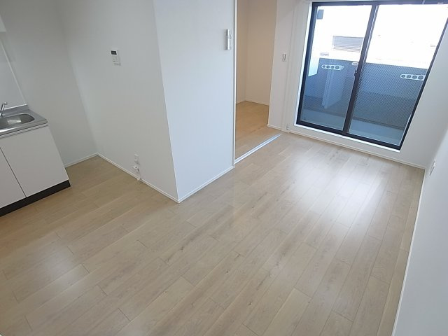 T.A海運町8丁目ⅢA棟の居間・リビング|ナチュラルカラーのリビングスペース