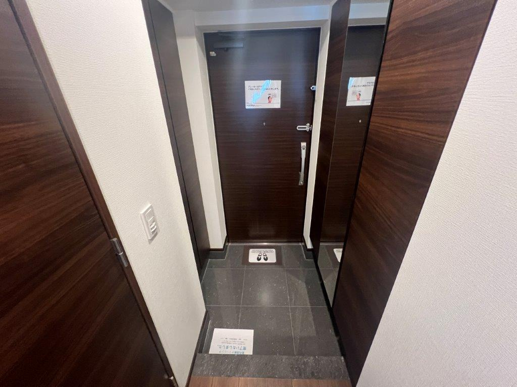 Nステージ東小金井の玄関|別部屋の写真です