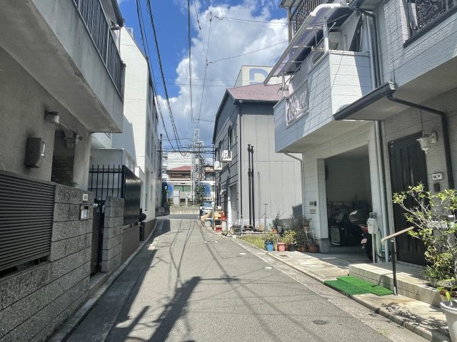 芦屋市打出町　土地　現況更地の前面道路含む現地写真