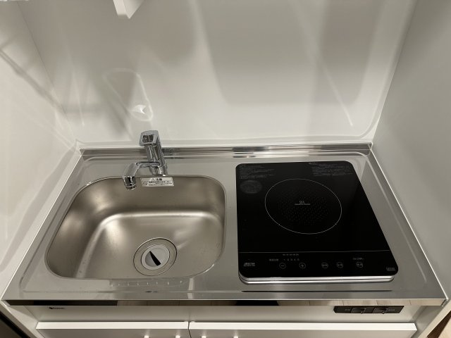 稲城市東長沼のアパートのキッチン