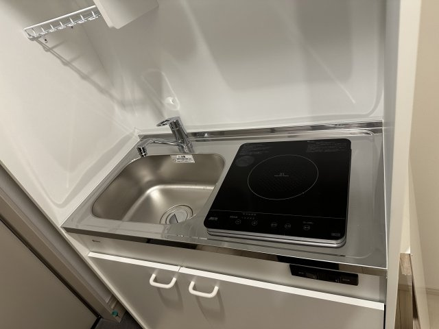 稲城市東長沼のアパートのキッチン