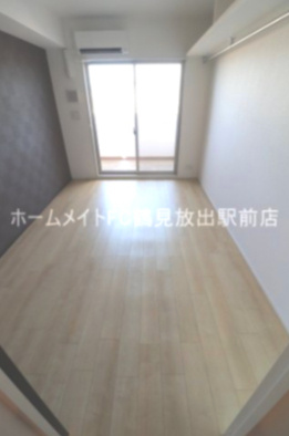 大阪市鶴見区放出東３丁目の賃貸マンションの洋室
