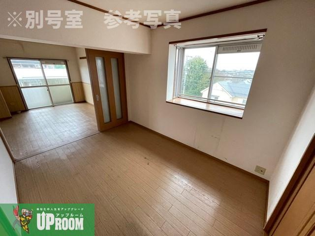 グリーンハイツ白山第1の洋室