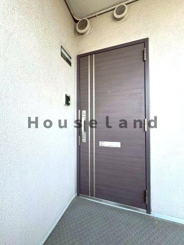 朝日プラザ鳴神の玄関