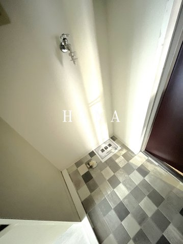 海楽新井マンションの居間・リビング|洗濯機置き場