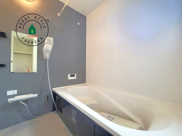 福岡市南区老司1丁目第8-3棟（3号棟）の内観：施工例|1日の疲れを癒してくれる広々バスルーム。雨の日のお洗濯にも大活躍な浴室乾燥機付です！