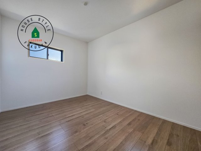 福岡市南区老司1丁目第8-3棟（3号棟）の内観：施工例|落ち着いた色調の洋室です。