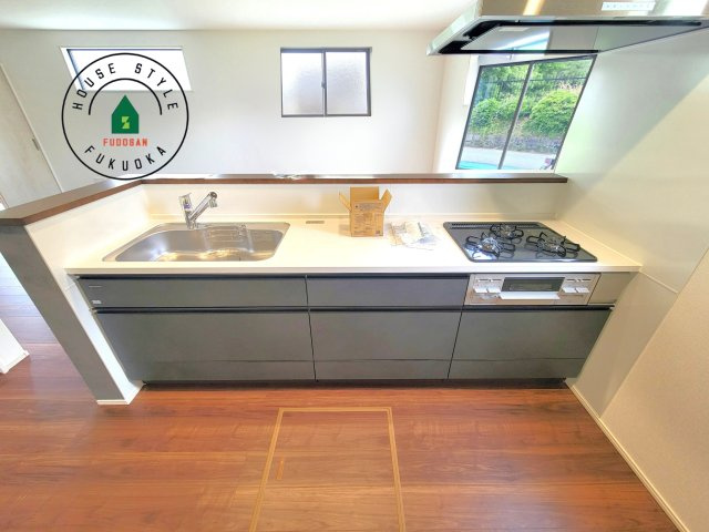 福岡市南区老司1丁目第8-3棟（3号棟）の内観：施工例|キッチン。グリル・食器洗い乾燥機・浄水器も完備。